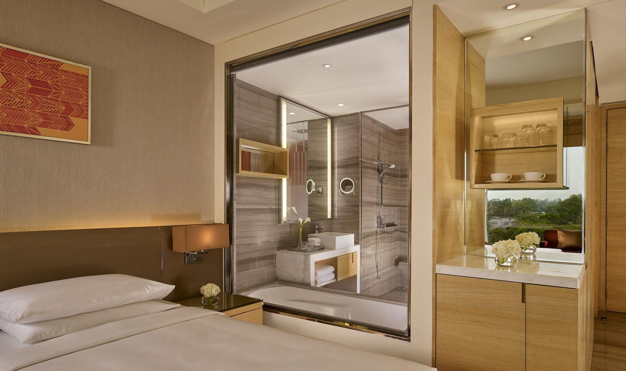 Hyatt Regency Chandīgarh Екстериор снимка A bathroom with a glass shower enclosure